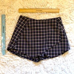 Plaid black, purple, and white skort
